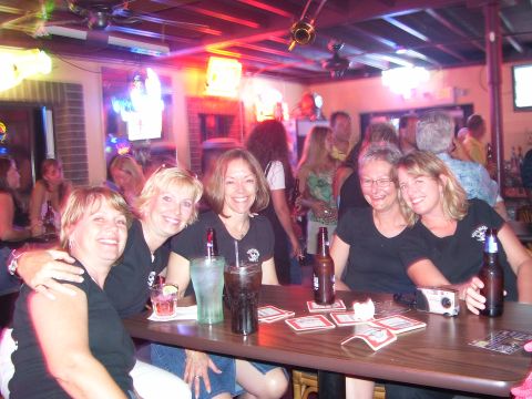 1994 Ford Probe - Friends gather at a bar for drinks and conversation.