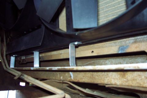 1996 Ford Bronco - Bottom Mounting Brackets The bottom mounting brackets carry the weight and sit on the tray under the radiator. There are 4 (3 visible in pi…