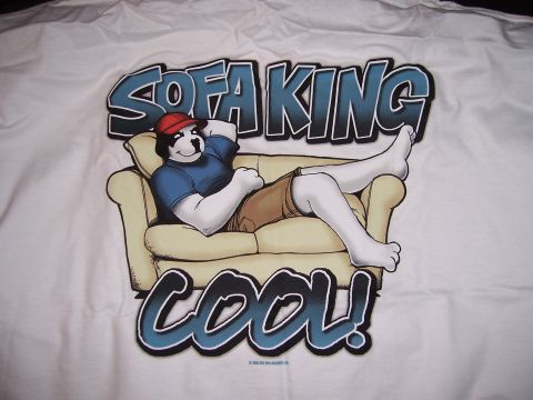 1983 Ford Bronco - A cartoon dog relaxes on a couch, with text that reads "SOFA KING COOL!"