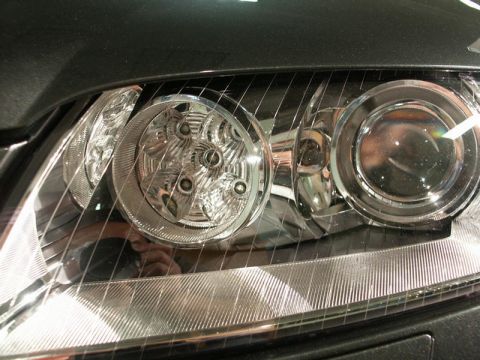 2001 Mercury Grand Marquis - This image shows a detailed view of a modern car's headlight assembly, focusing on its lighting components.