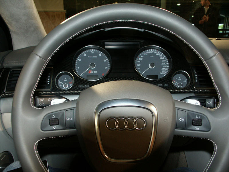 Close-up of Audi S8 steering wheel and dashboard gauges