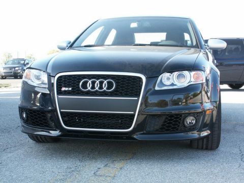 2001 Mercury Grand Marquis - Front view of a black Audi RS4 with its distinctive grille and headlights.
