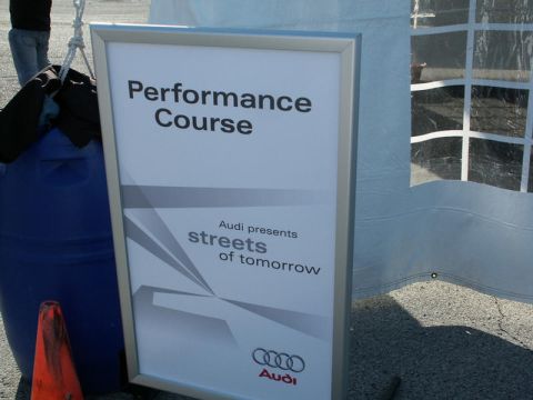 2001 Mercury Grand Marquis - A sign advertises the 'Performance Course' presented by Audi as part of their 'Streets of Tomorrow' initiative.