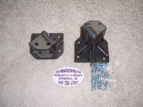 1996 Ford Bronco - Two metal brackets and hardware are shown, likely for automotive use.