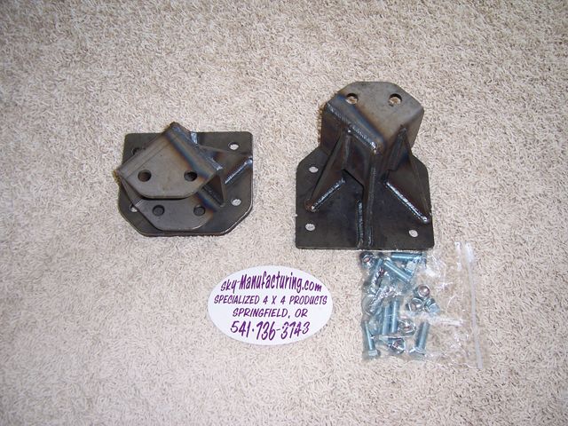 Sky Manufacturing steel 4x4 shackle brackets with bolt hardware kit on carpet