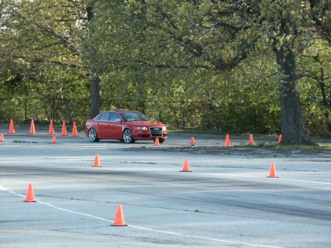 2001 Mercury Grand Marquis - An Audi A4 navigates a cone course on a paved lot.