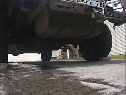 1994 Ford Bronco - Underside view of a 1994 Ford Bronco, showing the fuel tank and rear axle.