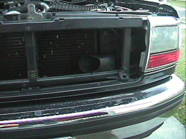 1994 Ford Bronco front grille and radiator assembly with chrome bumper detail