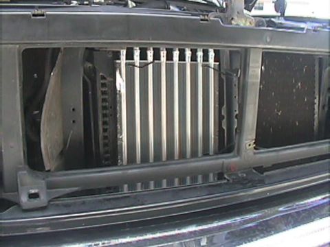 1994 Ford Bronco - Radiator and transmission cooler assembly visible through the front grille opening.
