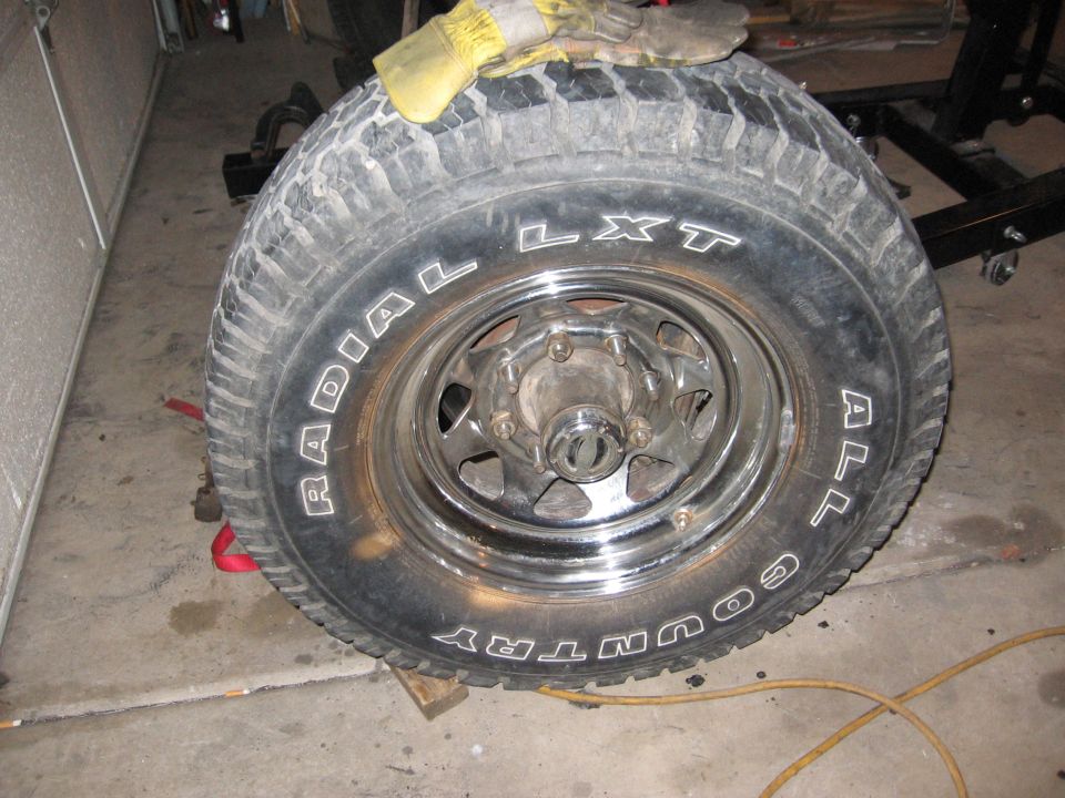 Radial LXT Country All-Terrain tire on chrome wheel
