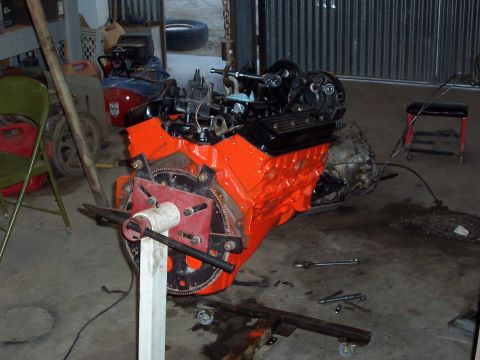 1981 Ford F-150 - V8 engine and transmission assembly being worked on in a garage setting.