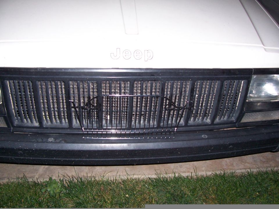 Jeep Cherokee XJ grille with a wire bug screen installed