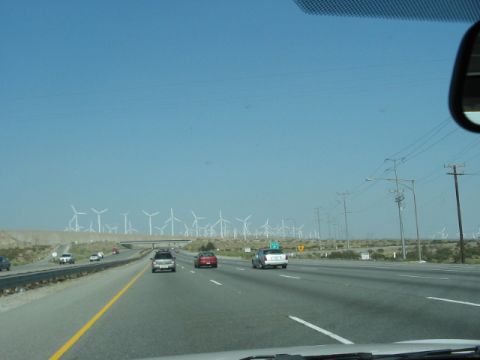 1991 Ford Bronco - Driving on a highway with numerous wind turbines visible in the distance.