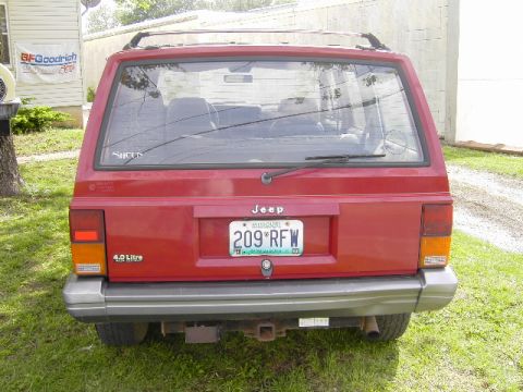 1991 Jeep Cherokee - This 1991 Jeep Cherokee is seen from the rear, its iconic body style and a Missouri license plate.
