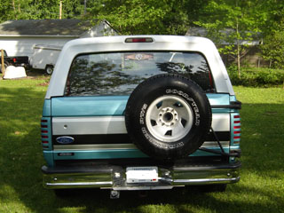 1994 Ford Bronco - This Ford Bronco is seen from the rear, a spare tire and a two-tone paint scheme.