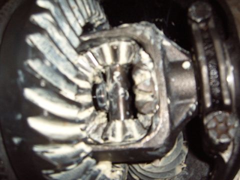 1988 Ford Bronco - Differential gears are visible in this close-up shot, covered in white grease.