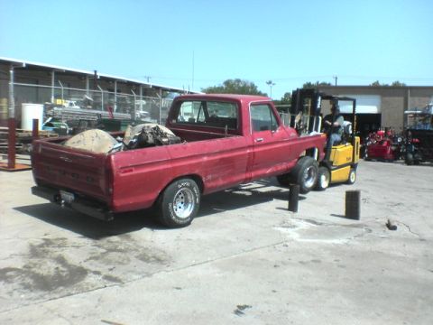 1991 Ford Bronco - pulled that piece with the 4klift to the paint/powerwash booth to spray alll the oil and dirt underneath