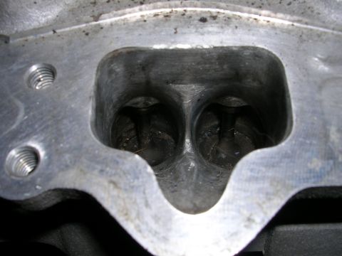 1996 Ford Probe - This is a close-up view of an engine's cylinder head, showing two intake ports.
