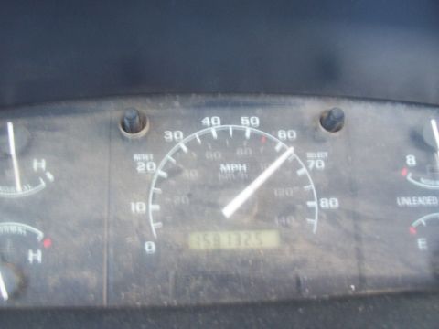 1994 Ford F-150 - The dashboard displays a speedometer and odometer, but no year is visible.