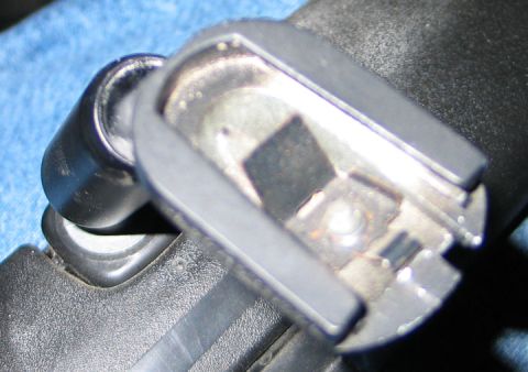 1994 Ford Bronco - Detail of a car's internal door lock mechanism, showing the moving parts.