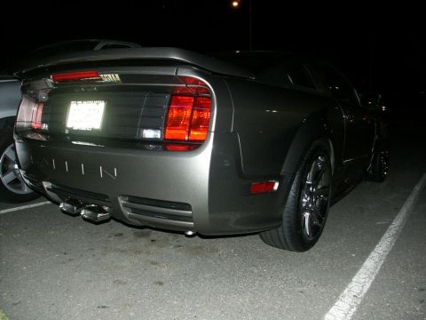 2001 Mercury Grand Marquis - Rear view of a 2005 Ford Mustang Saleen, showing its distinctive taillights and quad exhaust.
