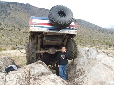 1989 Ford Bronco - This 1989 Ford Bronco is positioned precariously between large rocks during an off-road excursion.