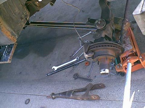 1983 Ford Bronco - here is the new arm installed and the old one below.