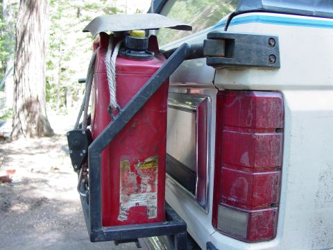 1986 Ford Bronco - This 1986 Ford Bronco features a rear-mounted jerry can, a common accessory for off-road adventures.