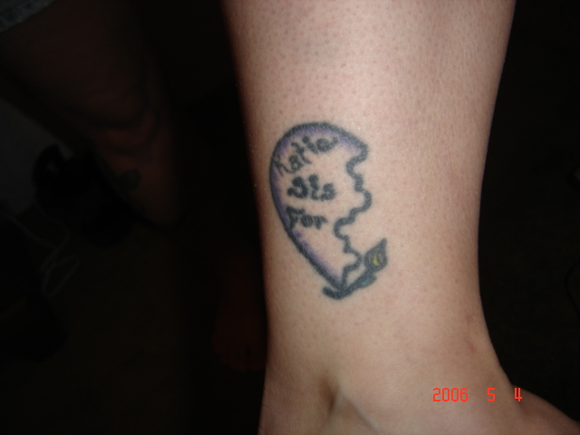 Tattoo of a broken heart with text 'Hate Sis For'