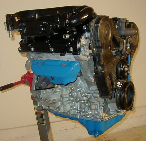 1995 Ford Probe - Right hand side complete with stock ZE header.