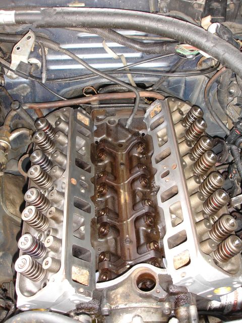 1989 Lincoln Continental - Close-up view of the internal engine components, including cylinder heads and valve train.