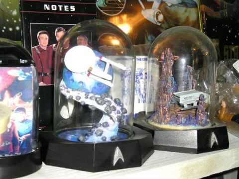 1984 Pontiac Fiero - A collection of Star Trek themed display items, including a model of the Enterprise and a shuttlecraft.