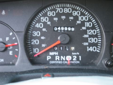 1991 Ford Crown Victoria LTD - The vehicle's dashboard displays the speedometer, odometer, and gear selection indicator.