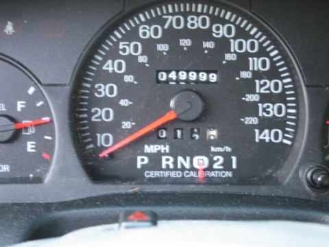 1991 Ford Crown Victoria LTD - Interior view of a vehicle's dashboard gauges, displaying mileage and gear selection.