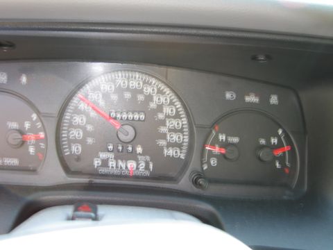1991 Ford LTD Crown Victoria - The dashboard of a 1991 Ford Crown Victoria LTD displays the odometer reading of 55,000 miles and the gear selector in Park.