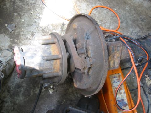 1995 Ford Bronco - i started the quick and dirty way of getting the brakes off. but i didn't finish. there's the backing plate with most of the springs and bo…