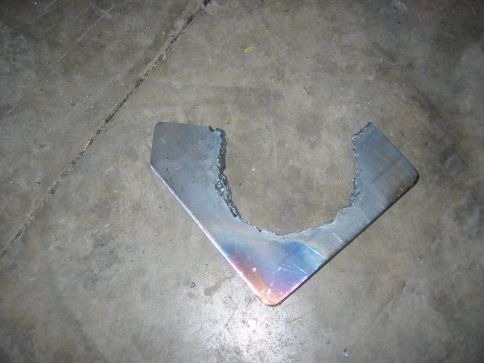 i found a thouro writeup on putting disk brakes with a parking brake on a sterling. this is one of the spacers before i cleaned up the curve and drilled the holes.