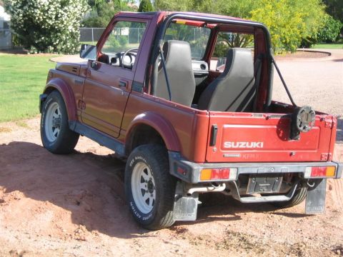 1987 Suzuki Samurai - This 1987 Suzuki Samurai is shown from the rear, displaying its iconic SUZUKI KFM badging.