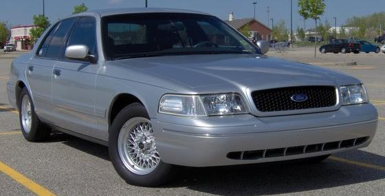 Silver 2002 Ford Crown Victoria 3/4 front view