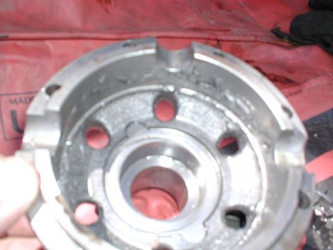 1979 Ford Bronco - Metal automotive part with visible text 'MADE IN U.S.A.' and red material inside.