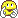 1996 Ford Crown Victoria - A simple cartoon drawing of a yellow character, possibly a dog, with a happy expression.