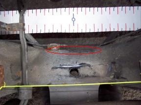 2000 Ford Crown Victoria - Section of crossmember needing "adjustment" for Marauder pan to fit properly. Brake line relocated underneath crossmember.