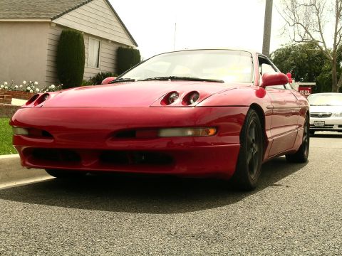 1993 Ford Probe - This 1993 Ford Probe is captured in a front 3/4 view, parked on a residential street.