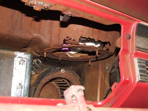 1966 Ford Ranchero - Severe rust damage visible on interior car components, likely from water intrusion.