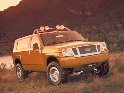 1993 Ford Bronco - This concept SUV, possibly a Ford Bronco variant, is shown in a three-quarter front view against a natural backdrop.