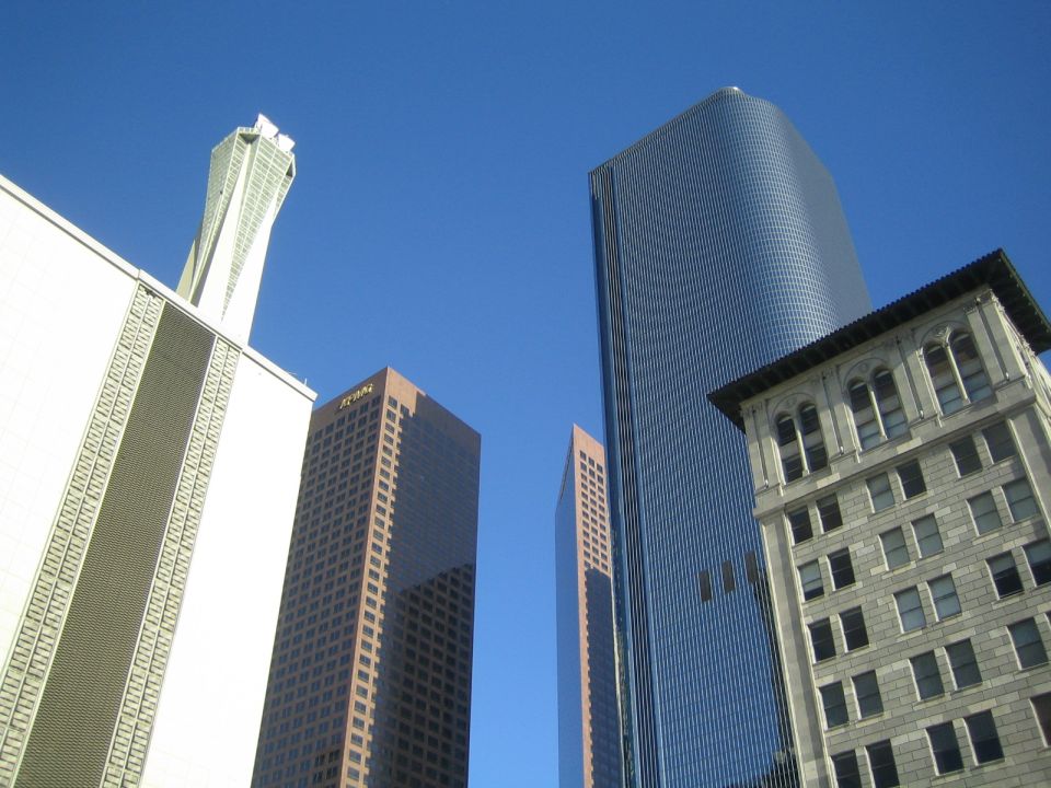 City skyline with skyscrapers under a clear blue sky