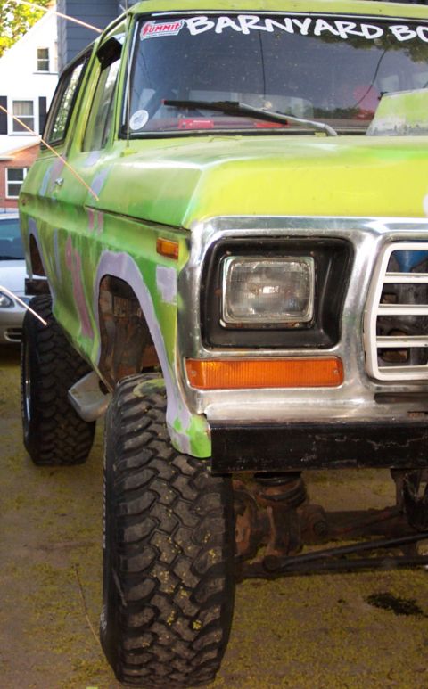 1978 Ford Bronco - This modified Ford Bronco features a bright green paint job and oversized off-road tires.