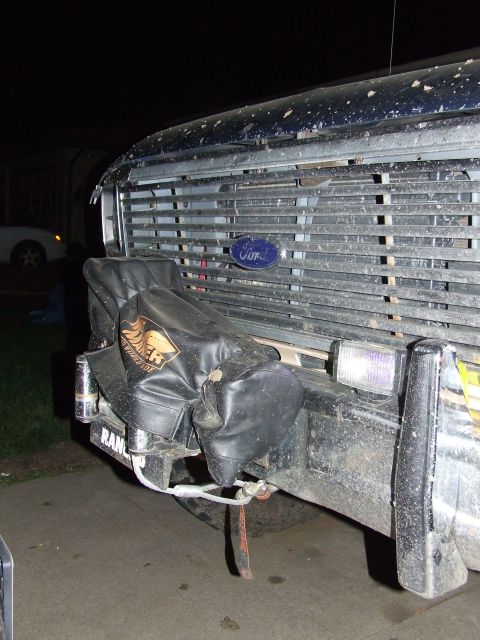 1986 Ford Bronco - Close-up of the front of a Ford Bronco, showing the grille and bumper details.