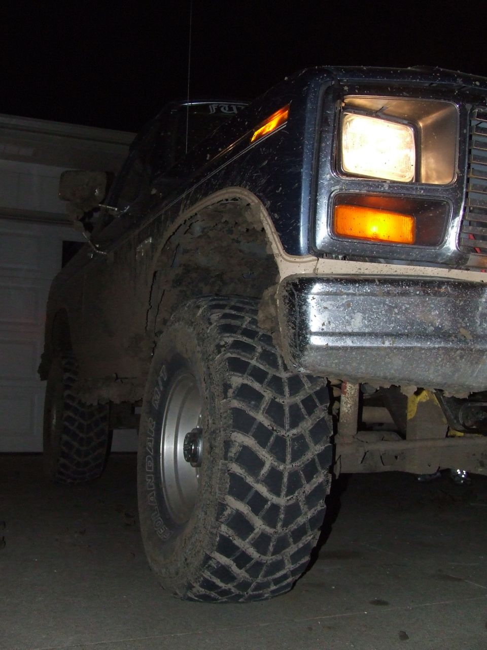 1986 Ford Bronco front corner with large off-road tires