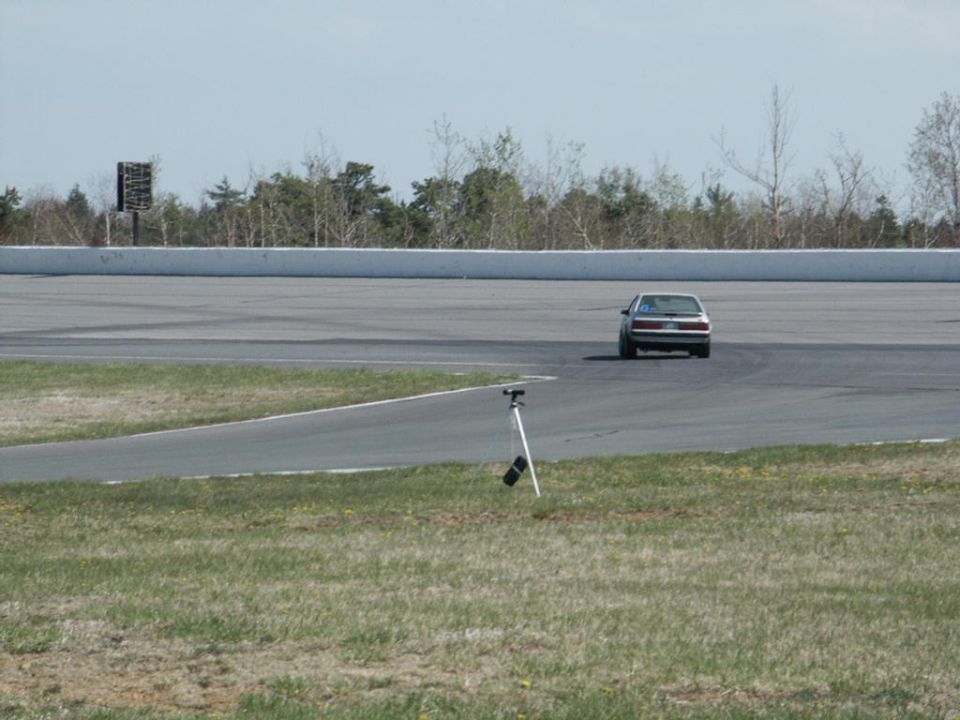 2001 Mercury Grand Marquis on a race track, rear view